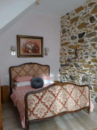 Ένα ή περισσότερα κρεβάτια σε δωμάτιο στο Gite colombe des bois
