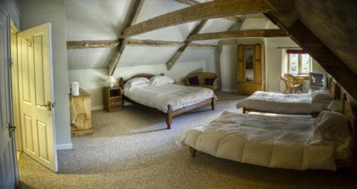 Säng eller sängar i ett rum på Neeld Arms