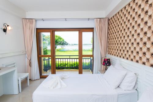 Imagem da galeria de Baan Talay See Cream Resort em Samut Songkhram