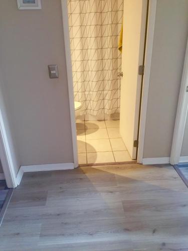 a room with a hallway with a floor at VistaMar Club de Yates, Concón, Viña del Mar in Concón