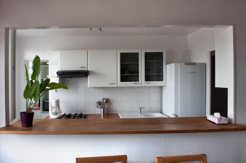 Kjøkken eller kjøkkenkrok på Moderne et Lumineux