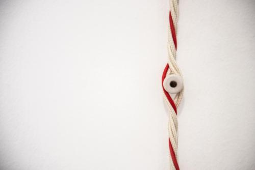 a close up of a piece of rope on a wall at L' Arena Suite - Sicilian style 140 mq flat with balcony and Arena seeview in Castellammare del Golfo