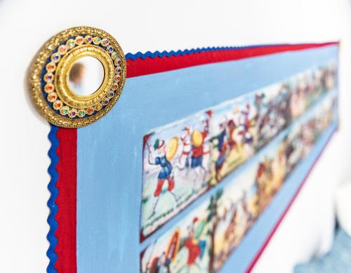 a close up of a ribbon with a gold medal at L' Arena Suite - Sicilian style 140 mq flat with balcony and Arena seeview in Castellammare del Golfo