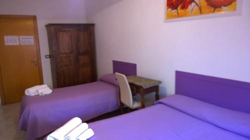 B&B Salento Vacanzeにあるベッド