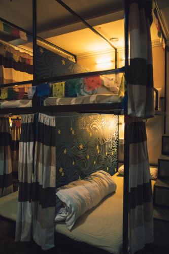 a group of bunk beds in a room at Wander Thirst in Kathmandu