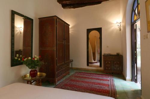 Giường trong phòng chung tại Riad Merstane Marrakech