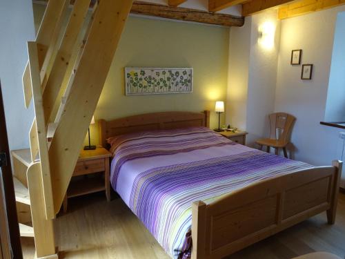 Кровать или кровати в номере Stalut das puestines