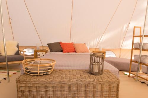 a room with a couch and a table on a boat at GoOutside Venezia in Cavallino-Treporti