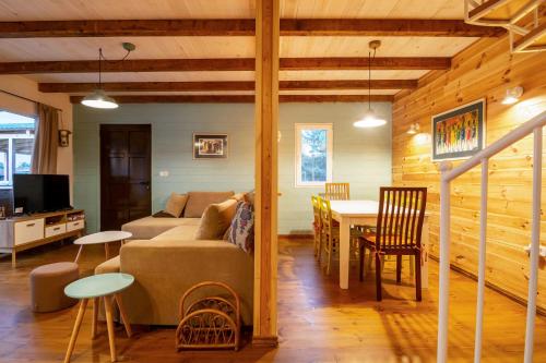 a living room with a couch and a table at Hakuna Matata Apartments in Ulcinj