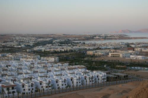 an aerial view of a city with white buildings at Rivera Sharm Habiba Apartments in Sharm El Sheikh