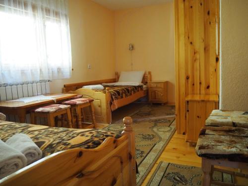 Postel nebo postele na pokoji v ubytování Орбелус