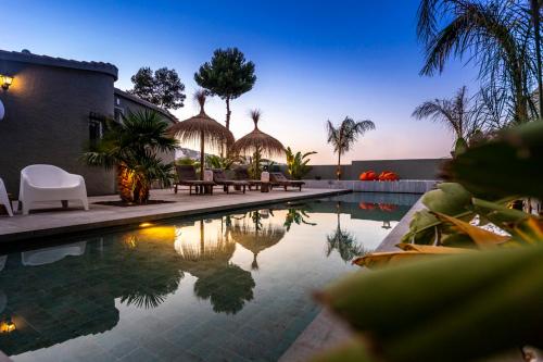 Boutique Villa Moraira, private luxe villa with views all at one level 1000m2, heated pool & jacuzzi WIFI close to center Moraira