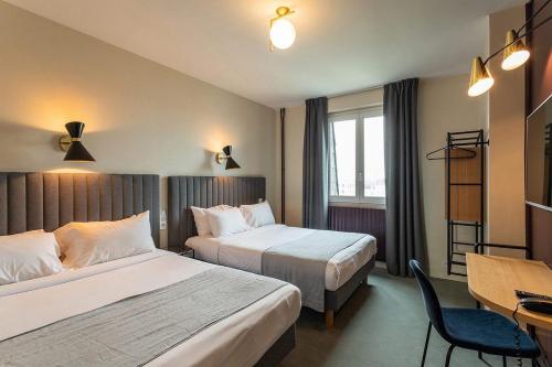 Кровать или кровати в номере Grand Hotel de la Gare
