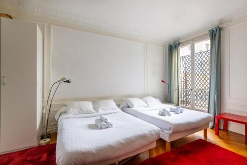 Ein Bett oder Betten in einem Zimmer der Unterkunft Veeve - Balcony Bliss