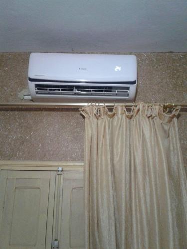 a laptop computer sitting on top of a counter at Auberge Gitelkst in Tafraoute