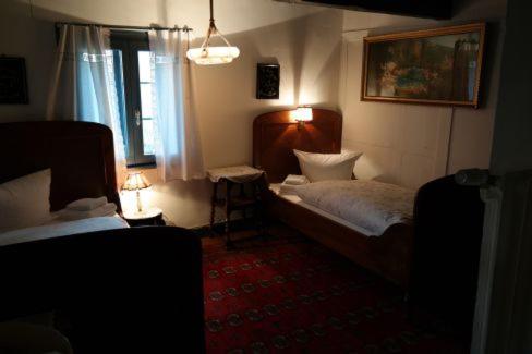 Llit o llits en una habitació de Gästehaus Howe