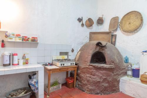 Кухня или мини-кухня в Hostal El Caminante
