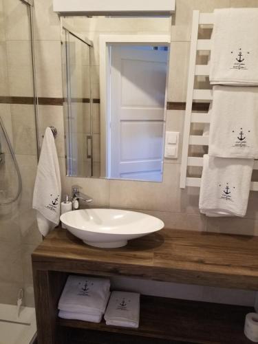 Koupelna v ubytování Apartamenty Marynarskie 100m od plaży