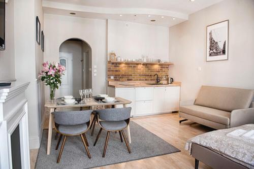 Posedenie v ubytovaní Apartament Kopernika 25