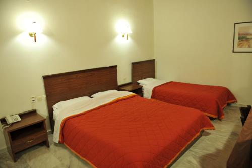 Postel nebo postele na pokoji v ubytování Hotel Edelweiss