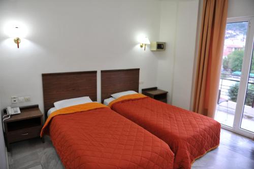 Postel nebo postele na pokoji v ubytování Hotel Edelweiss