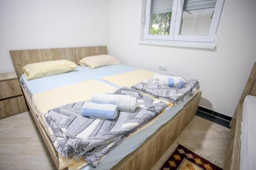 Ліжко або ліжка в номері Apartments River Una 3