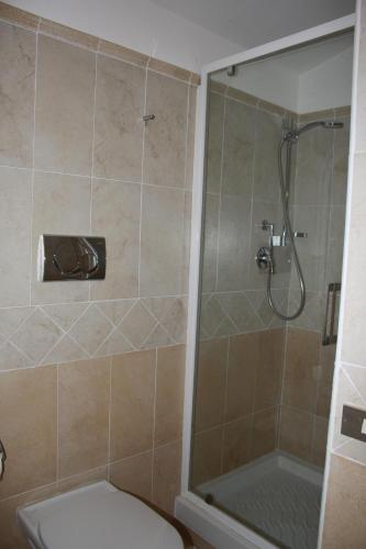 Et badeværelse på Appartamento in villa