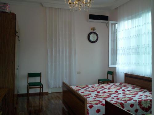 Postel nebo postele na pokoji v ubytování liziko's House
