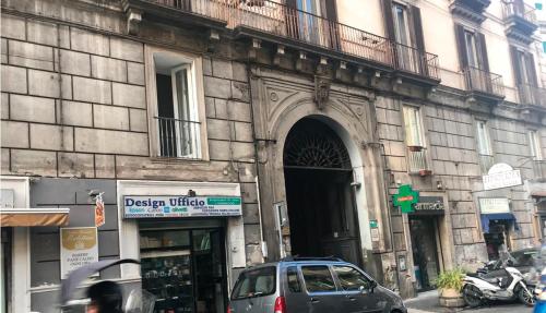 a car parked in front of a building at B&B La casa di Cò in Naples