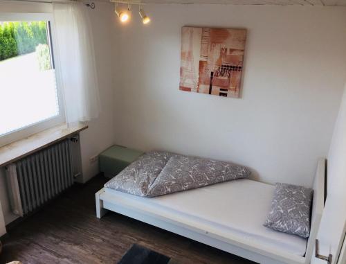 Postel nebo postele na pokoji v ubytování Apartment unterm Schloss