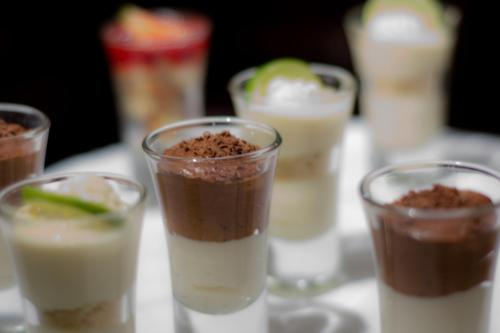 a group of glasses filled with different types of desserts at Ritz Apart Hotel in La Paz