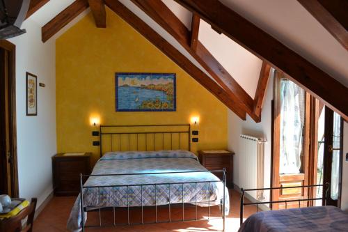 a bedroom with a bed in a room at Luna D'Agerola in Agerola