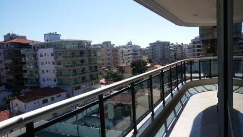 a balcony with a view of a city at Apartamento em Cabo Frio RJ - Praia das Dunas in Cabo Frio