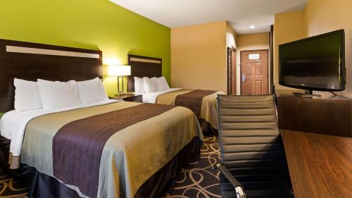 Postel nebo postele na pokoji v ubytování Best Western Plus Kenedy Inn