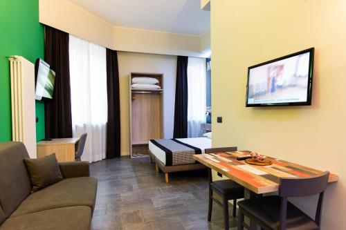 Μια τηλεόραση ή/και κέντρο ψυχαγωγίας στο Aparthotel Porta Nuova