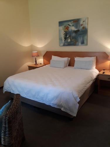 Ένα ή περισσότερα κρεβάτια σε δωμάτιο στο The Bedford View Guest House