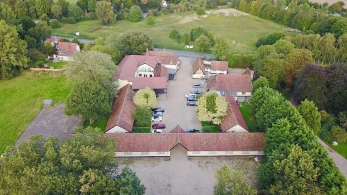 an aerial view of a large house with a parking lot at Best Western Brome Grange Hotel in Brome