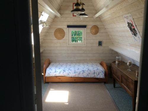 Letto o letti in una camera di chambre au calme a Botquelen