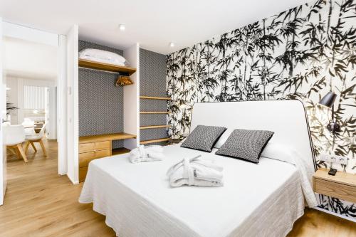Cama ou camas em um quarto em Hotel Anabel