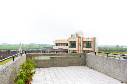 a view of a building from a balcony at Jerry B&B in Taitung City