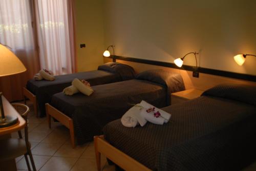 Krevet ili kreveti u jedinici u okviru objekta Hotel Gran Delta