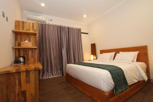 Letto o letti in una camera di Saka Boutique Hotel
