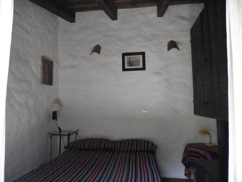 Posteľ alebo postele v izbe v ubytovaní Casa Torre Antigua