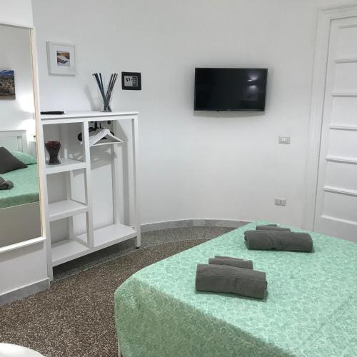 Postel nebo postele na pokoji v ubytování Mellos B&B