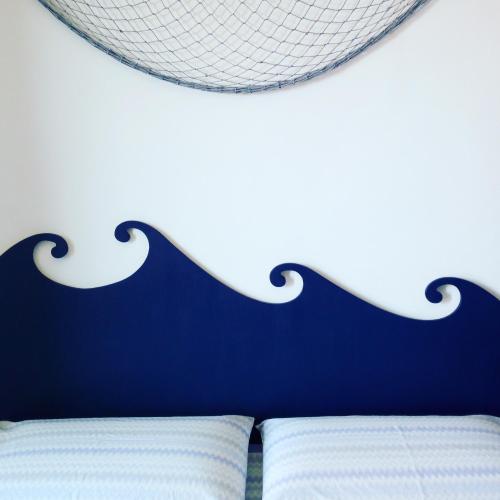Letto o letti in una camera di B&B La Menaica