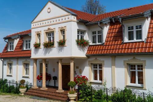 Gallery image of Apartamenty i Pokoje Gościnne Salon z kominkiem Dworek Niespodzianka z dużym ogrodem in Szklarska Poręba