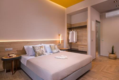 a bedroom with a large bed in a room at On The Rocks in Theologos