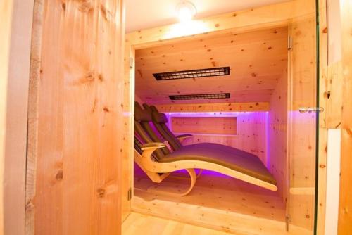 a log cabin with a bench inside of it at Chalet Stubai inklusive Stubai Super Card in Fulpmes