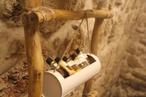 a toilet in a wall with some bottles in it at Zidan Sarai in ‘Akko