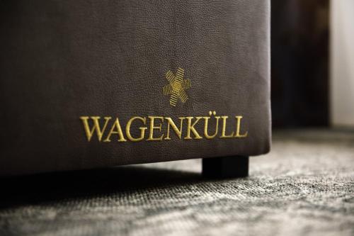 a brown book with the words wavermutilus on it at Castle Spa Wagenküll in Taagepera